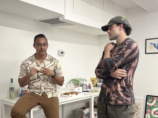 Edward Rocha in conversation with a client
